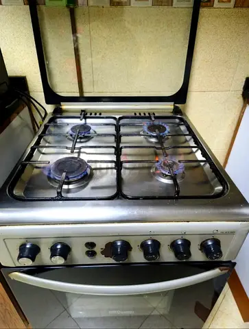 Used 4-Burner Gas Cooker with Oven - Stainless Top, Good Working Condition