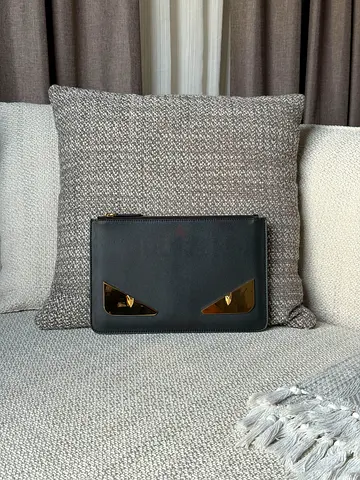 Fendi Black leather clutch with gold-tone eye detailing - super master quality
