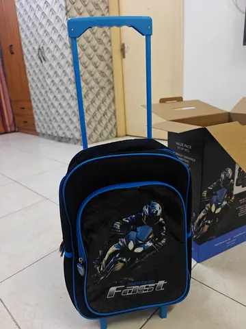 Kids Blue Motorcycle Trolley Backpack - Good Condition Location sharjah