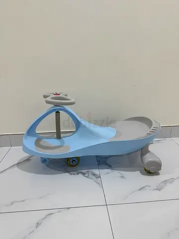 Twister ride on car