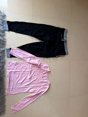 Casual black joggers and pink long-sleeve top - good condition