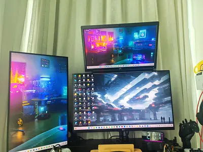 3 monitors setup for sale with their arms