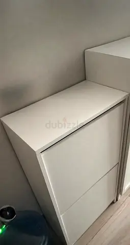 Slim white 2‑door shoe cabinet — compact hallway storage