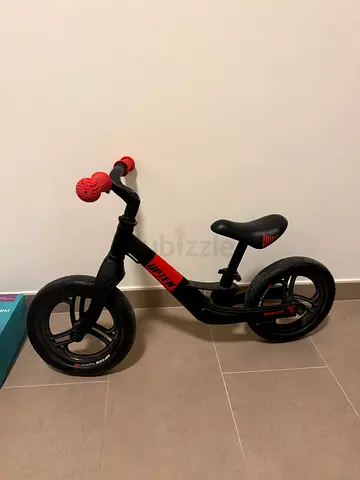 Lightweight balance bike for toddlers - black/red, good condition