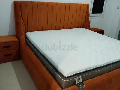 Luxurious Modern Bed with Plush Upholstery