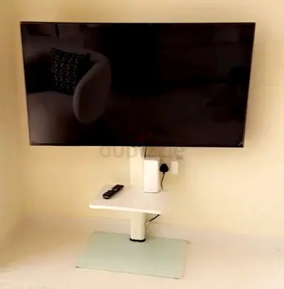 Swivel Floor TV Stand with Media Shelf
