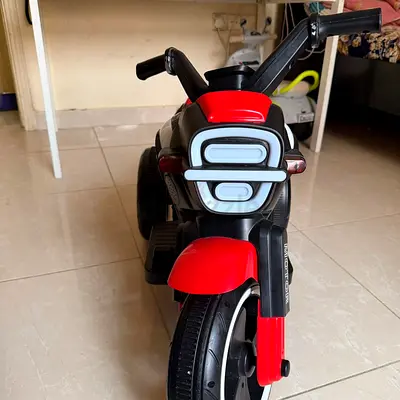 Urgent selling leaving home counKids 3-Wheel Electric Ride-On Motorcycle — Red/Black, Good Condition
