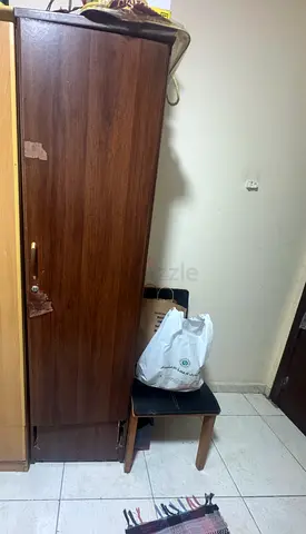 Free Single-door wooden wardrobe / storage cabinet in good usable condition
