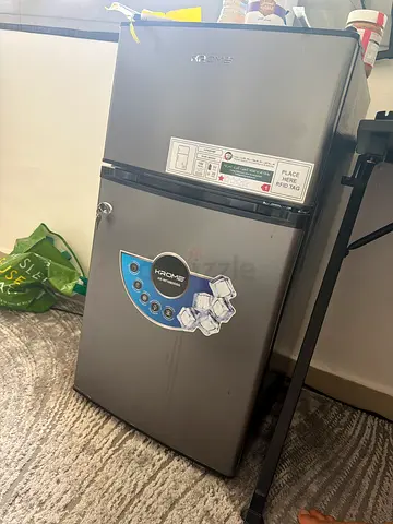 Small single-door mini fridge - compact black unit, good condition