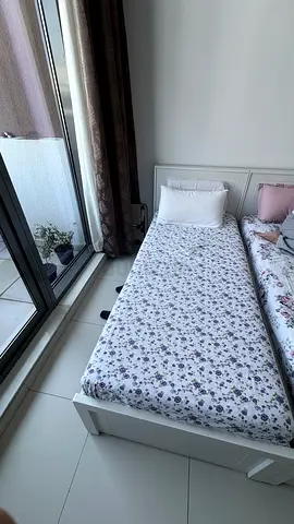 Single white wooden bed frame with mattress included