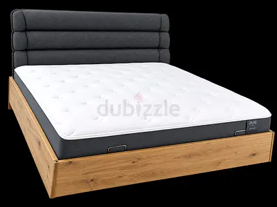 Queen wooden platform bed frame with upholstered headboard and mattress