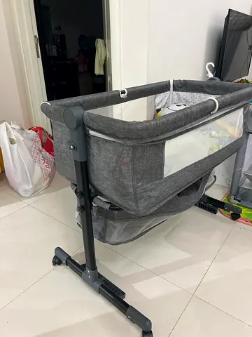 Grey portable bassinet / cradle with stand - good condition