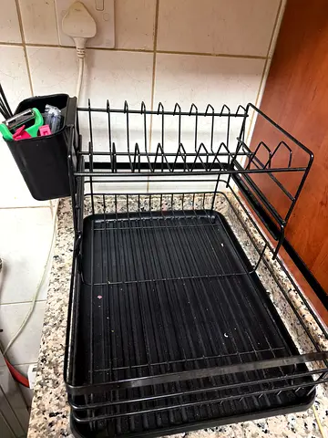 Black over-sink dish drainer with cutlery holder - used