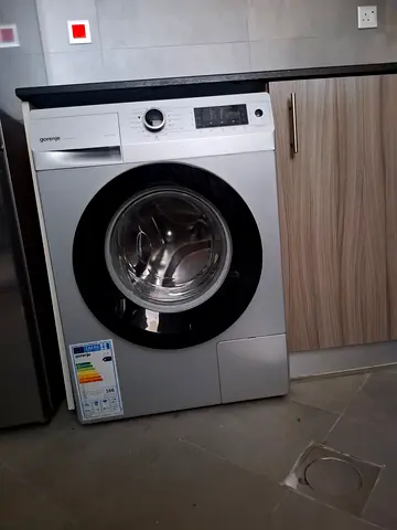 Silver front-load washing machine - good working condition
