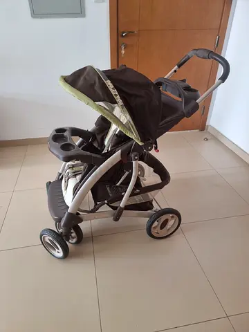 Used 3-in-1 Baby Stroller with Reversible Seat and Canopy. Location Dubailand