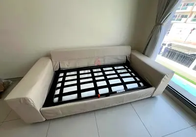 Beige 2-seater Sofa Bed with Pull-out Frame — Good Condition