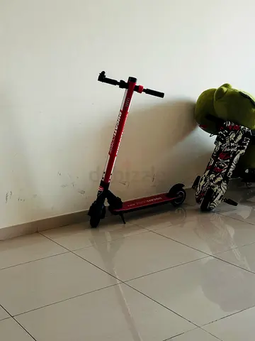 Red electric scooter - used, working condition
