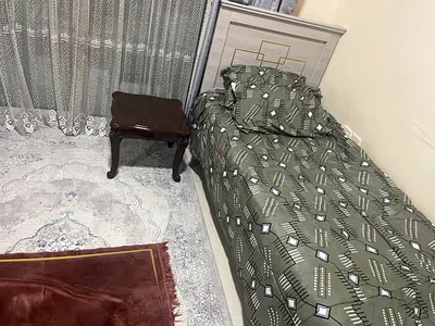 Single bed with mattress and bedside table - good condition