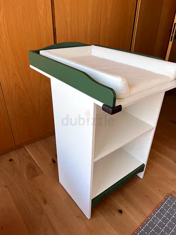 White and green baby changing table with open storage shelves - perfect condition
