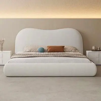 Modern upholstered queen bed with curved headboard