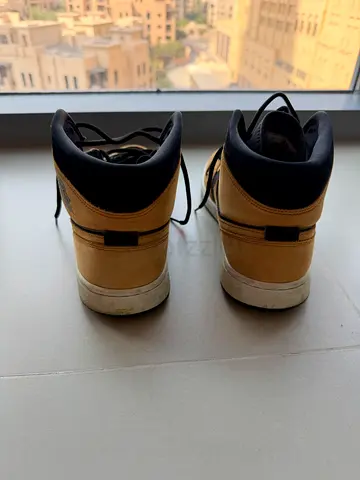 Nike used tan high-top sneakers, size unknown — good condition