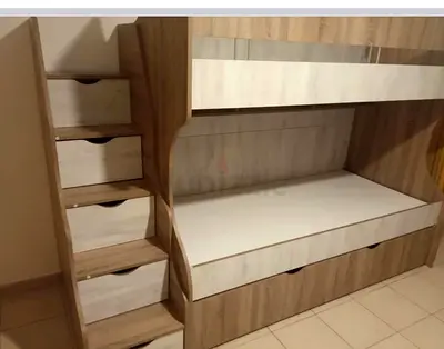 Wooden bunk bed with storage stairs and under-bed drawer - good condition
