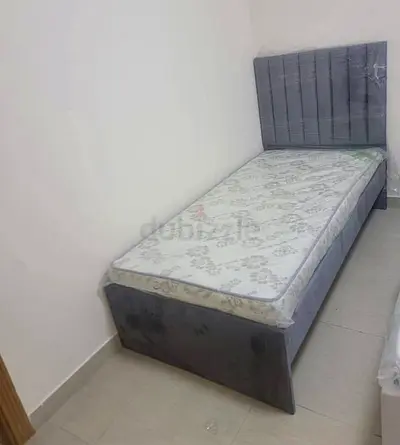 Single upholstered bed with mattress - good condition