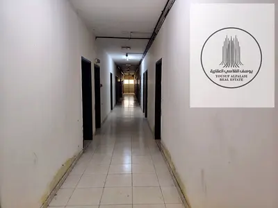 سكن عمال للإيجار في الجرف الصناعية 2 – 14 غرفة | يستوعب 112 شخص | الكهرباء والمياه والصيانة شاملة
