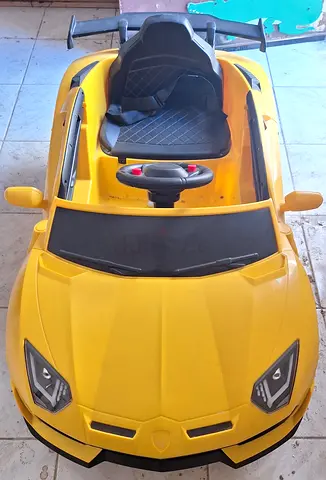Child's Yellow Electric Ride-On Sports Car - Single Seat