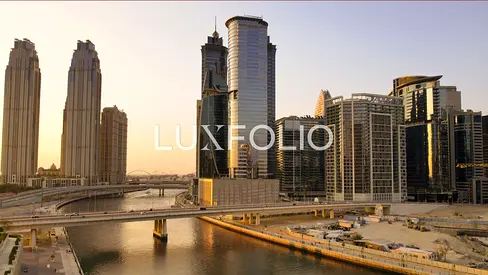Below OP | 1BR in DG1 Living | Sunset Canal View