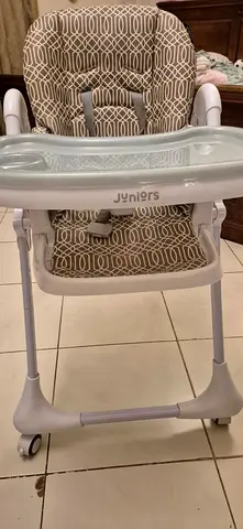 Juniors padded baby high chair with removable tray — good condition