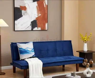 Blue convertible sofa bed with wooden legs - good condition