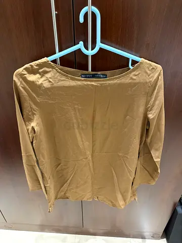 Brown long-sleeve women's top, size M - gently used