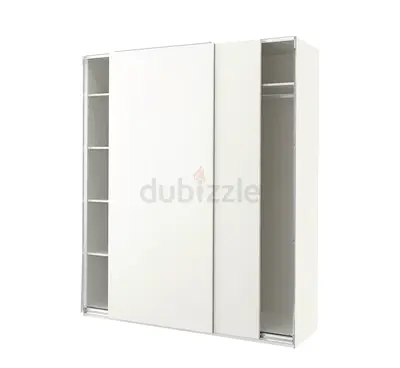 White sliding door wardrobe with shelving and hanging space