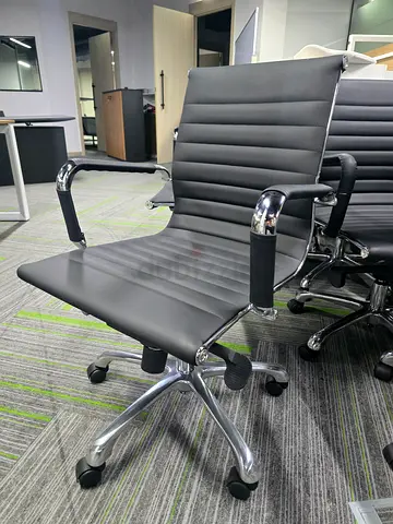 Set of modern grey office swivel chairs — good condition