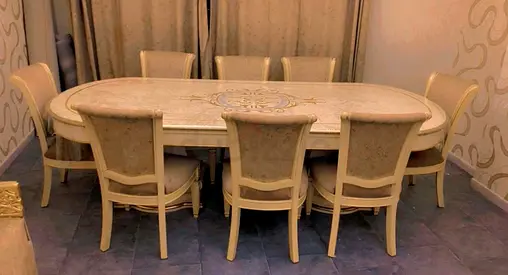Elegant cream dining table with 8 matching chairs - good condition
