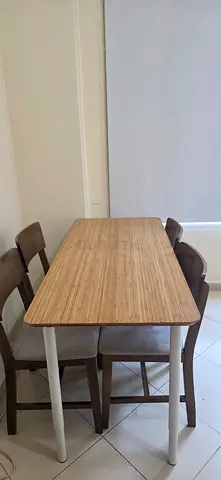 Compact wooden dining table with 4 chairs - good condition