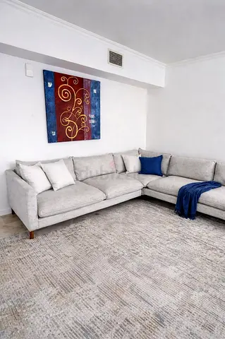 Selling in excellent Condition Pan Home U Shape Sofa Beige