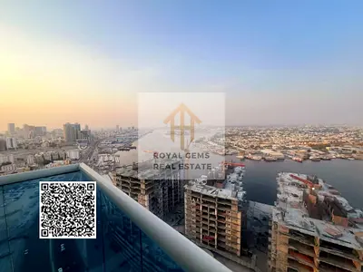 شقة مطلة ع المدينة وبحر الخور + موقع حيوي ( مباشرة ع شارع الشيخ راشد بن سعيد) + متاح التملك الحر 100%