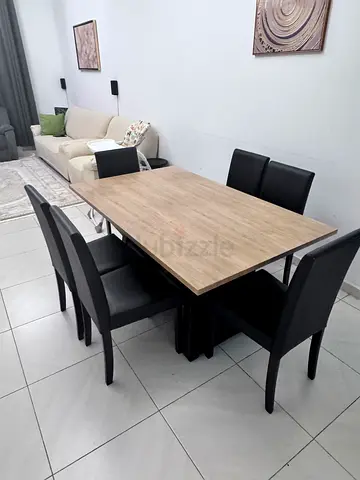 Wooden Dining Table with 6 Black Chairs - Good Condition