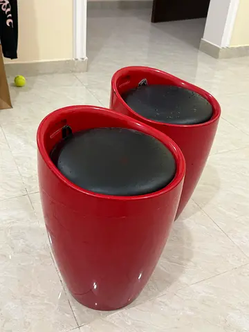 Pair of Modern Red Cylindrical Bar Stools with Black Padded Seats