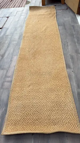 Long beige textured runner rug - good condition