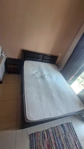 Queen size bed and nightstand