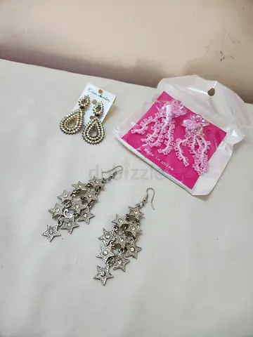 Pair of women's dangling earrings — silver stars + beaded set