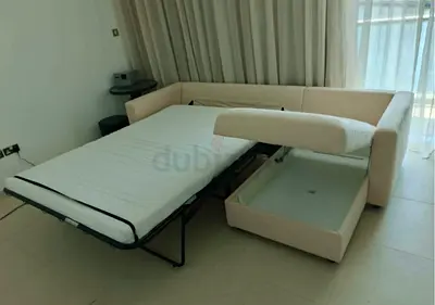 Light beige sofa bed with storage, good condition