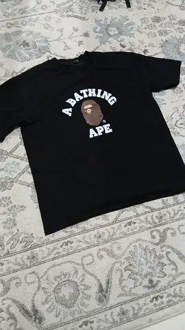 A Bathing Ape (BAPE) black logo tee - authentic style, good condition