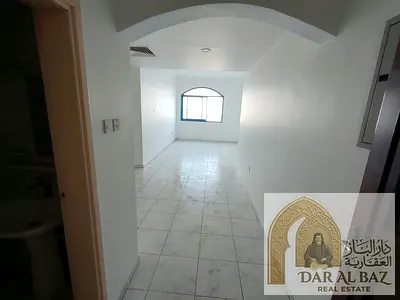 Two bedroom apartment with a living room available for annual rent in Abu Shagara in the Al Wahda area