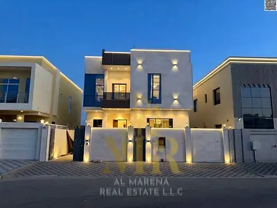 Villa for sale in Al Yasmin, Ajman | Two floors and a rooftop, central air conditioning, prime location near the mall | 10% down payment and monthly i