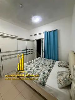 Fully furnished one-bedroom apartment ( 2 bathrooms ) with a hall, with balcony, including all servi