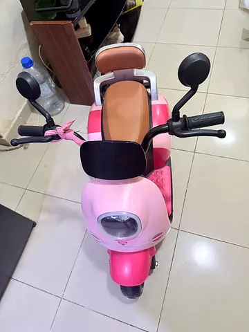Battery/manual operated scooter